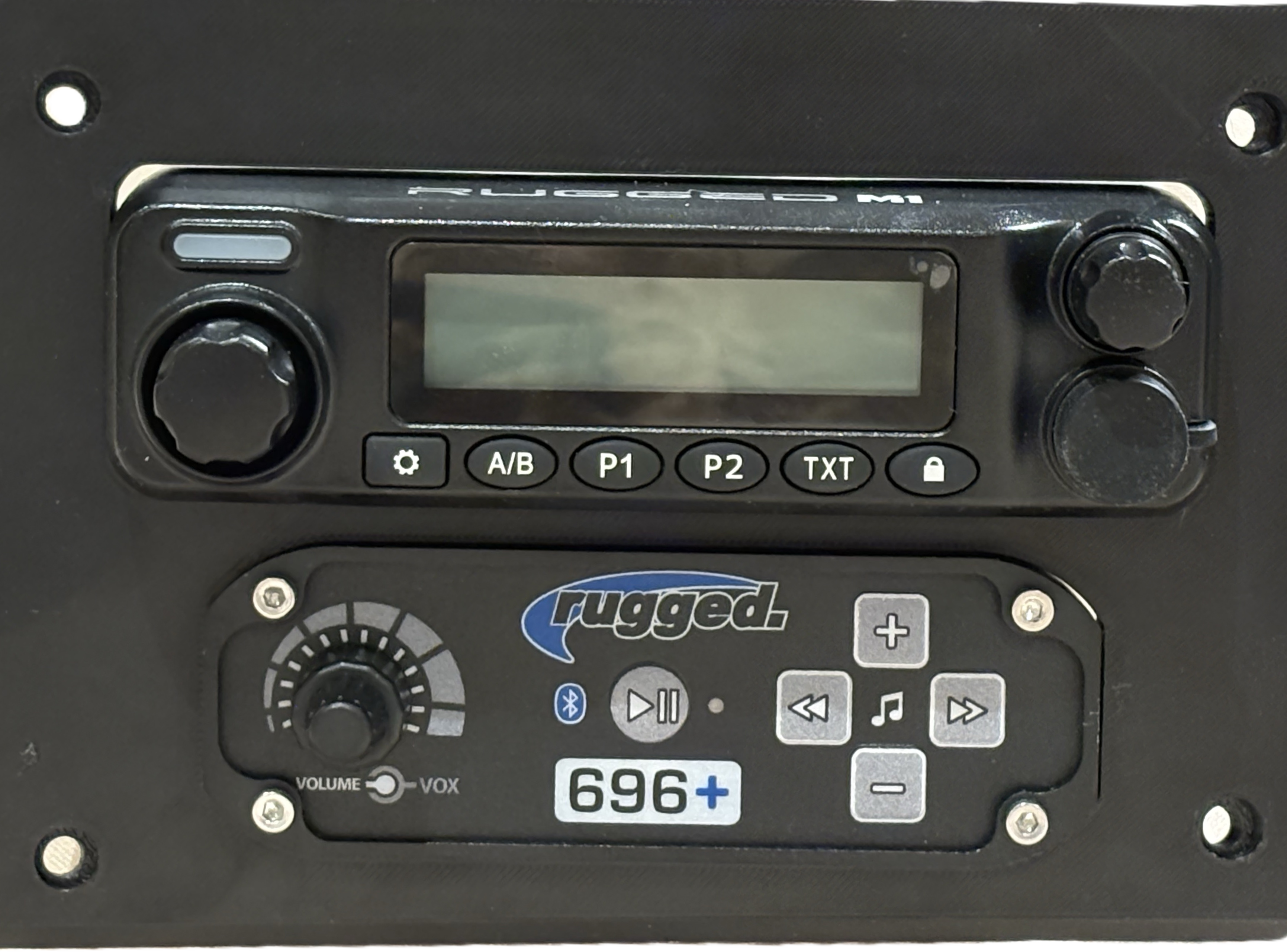 JEL Desing mounting bracket and bezel for Speed UTV with Rugged Radios M1 or Rugged Radios G1 plus a Rugged Radios Intercom. JEL-Design.  Often installed in conjunction with the JEL-Design Garmin Tread 2 GPS mount on a Speed UTV.  