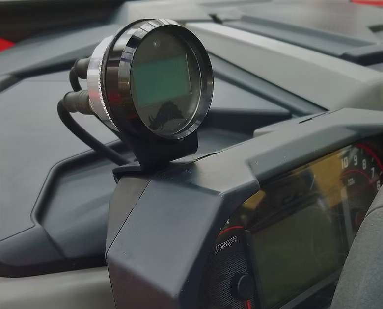 Razorback technology gage with  a Razorback mount bracket installed in a Polaris RZR Pro.  