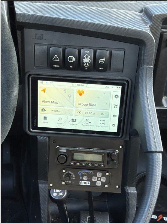 Image of JEL-Design Dash Panel mount for Garmin Tread 2 installed in the upper dash opening together with the Rugged Radios M! or G1  and intercom installed in the lower dash opening of a Speed UTV. OEM-style Factor installed look,  Elevate your ride.  Built for the Ride.